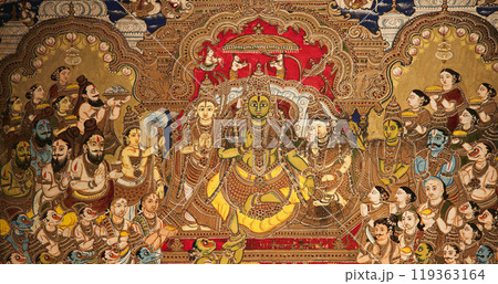 Close-up view on Ramapattabhisheka tableau. scene has Rama and Sita on throne. couple is flanked by Ramas brothers, Vibhishana, allies, rishis, kings, and noblemen 119363164