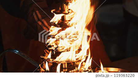 Varanasi, Uttar Pradesh, India. Candle Holder With Lit Candles On Ganga Maha Aarti Ceremony Begins. Fire Puja Ritual In Varanasi. Traditional Ganga Aarti At Ghat 119363220
