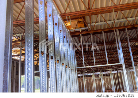 Steel beams profiles frame is used in construction of large commercial building Steel beams profiles frame is used in construction of large commercial building 119365819