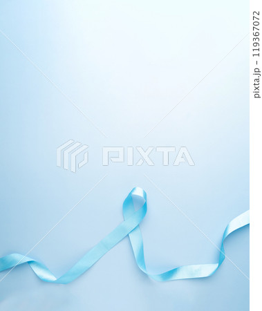 Men's health and Prostate cancer awareness campaign in November. Light blue ribbon awareness on sky blue background. Symbol for support men who living with cancer. Men's health and Prostate cancer awareness campaign in November. Light blue ribbon awareness on sky blue background. Symbol for support men who living with cancer. 119367072