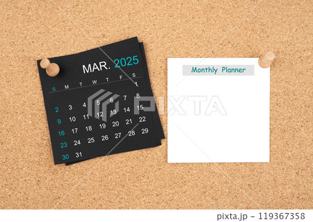 Calendar sheet for March 2025 and blank adhesive notes for monthly planner with thumbtack on wooden board. Calendar sheet for March 2025 and blank adhesive notes for monthly planner with thumbtack on wooden board. 119367358