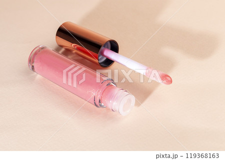 Lip gloss with applicator in light tubes. Cosmetic accessories. 119368163