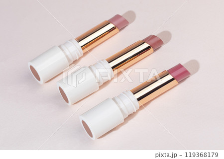 colored lipstick in light tubes. Cosmetic accessories. colored lipstick in light tubes. Cosmetic accessories. 119368179