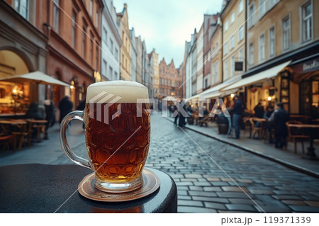 Beer mug set against a historic cobblestone street, evoking a European vibe 119371339