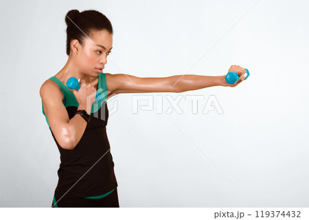 Strength Workout. Fit Afro Girl Doing Boxing Exercise Holding Dumbbells On Yellow Studio Background. 119374432
