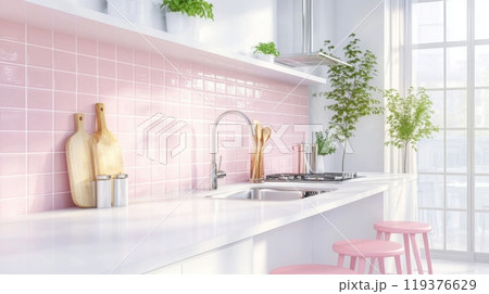 A spacious kitchen showcases a bright pink tile backsplash, sleek countertops, and modern stools. Sunlight filters in through large windows, highlighting plant accents and cooking utensils. 119376629