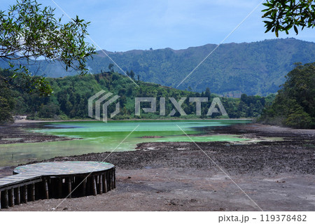 A stunning view of Telaga Warna, a colorful lake in Dieng Plateau, Indonesia. 119378482