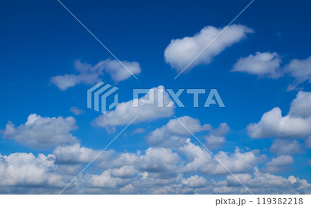 Beautiful blue sky with white clouds forming on sunny day Beautiful blue sky with white clouds forming on sunny day 119382218