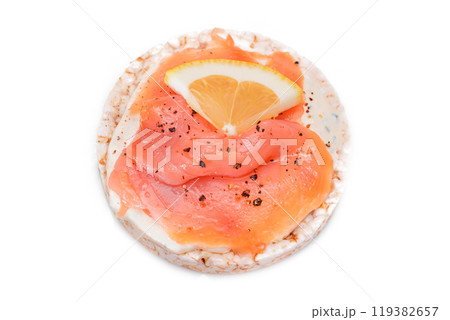 Rice Cake Sandwich with Fresh Salmon and Lemon - Isolated on White 119382657