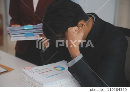 Audit concept,Administrator business man financial inspector and secretary making report calculating balance. Internal Revenue Service checking document. Audit concept,Administrator business man financial inspector and secretary making report calculating balance. Internal Revenue Service checking document. 119384530