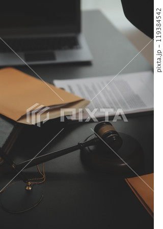 Law theme, gavel or mallet of the judge, lawyer enforcement officers, evidence-based cases taken into account in the court abount business, legislation. 119384542