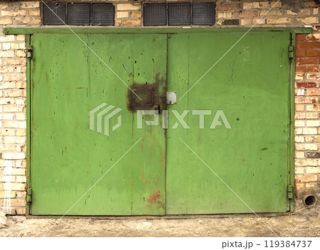 old metal door to the car garage 119384737