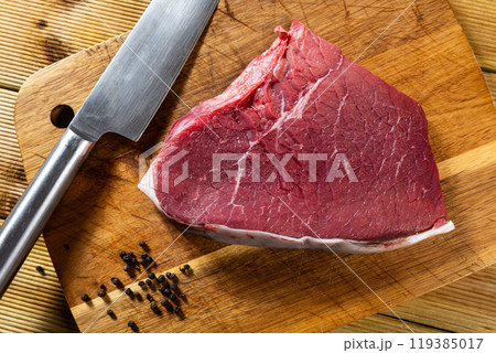 Pieces of raw thick beef steaks Pieces of raw thick beef steaks 119385017