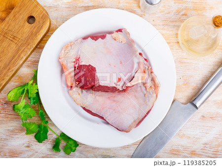 Pieces of raw thick beef steaks Pieces of raw thick beef steaks 119385205