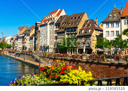 Summer day in Strasbourg, view of houses along canal Summer day in Strasbourg, view of houses along canal 119385520