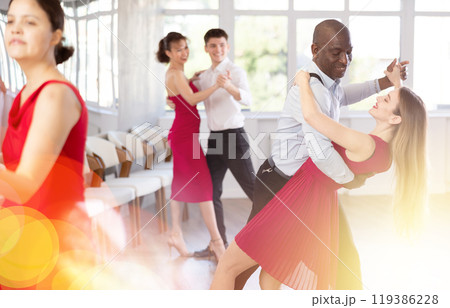Adult man and young woman dancing tango 119386228