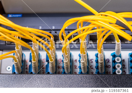 fiber optic cables connected into main data switch 119387361
