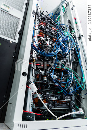 network cables connected into server inside data center 119387382