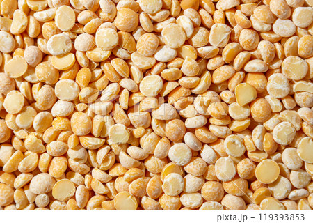 Uncooked Polished Split Peas Background Uncooked Polished Split Peas Background 119393853