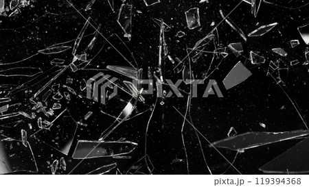 Close-up of shattering glass on black background , freeze motion 119394368