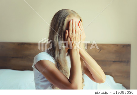 Upset sad crying woman while experiencing mental suffering, depression, fatigue, emotional stress Upset sad crying woman while experiencing mental suffering, depression, fatigue, emotional stress 119395050