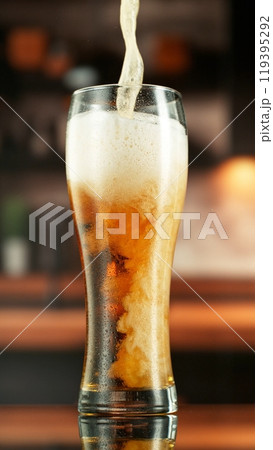 Pouring Beer into Long Glass, Vertical Composition. 119395292