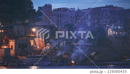 Varanasi, India. Funeral Rites Of Cremation At Harishchandra Ghat. Harishchandra Ghat Is One Of Only Two Ghats Serving As Cremation Sites Along Ganges River. Fire That Never Stops Sends Souls To Varanasi, India. Funeral Rites Of Cremation At Harishchandra Ghat. Harishchandra Ghat Is One Of Only Two Ghats Serving As Cremation Sites Along Ganges River. Fire That Never Stops Sends Souls To 119395435