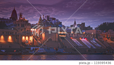 Varanasi, India. General View On Mata Anandamayi Ghat and Vaccharaja Ghat. Graffiti And Murals At Ghat. Derives Its Name From Illustrious Anandamayi Ma, Spiritual Luminary Of 20th Century. Evening At Varanasi, India. General View On Mata Anandamayi Ghat and Vaccharaja Ghat. Graffiti And Murals At Ghat. Derives Its Name From Illustrious Anandamayi Ma, Spiritual Luminary Of 20th Century. Evening At 119395436