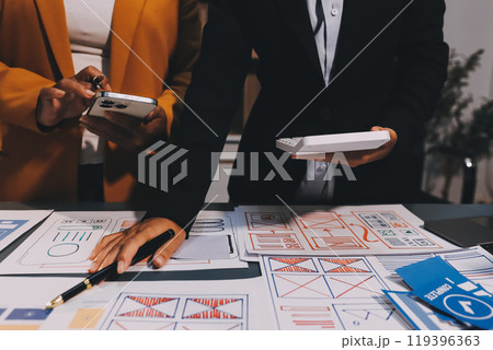 The designer team is designing the uxui system to make the uxui system work well on new phones and support system updates. Website development concept UI UX front end designer 119396363