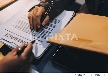 Judge gavel with Justice lawyers having team meeting at law firm background. Concepts of Law and Legal services. Judge gavel with Justice lawyers having team meeting at law firm background. Concepts of Law and Legal services. 119396394