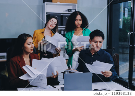 Stress, business people and employee frustrated with multitasking, pressure or overworked by team in chaos with paperwork. Anxiety, headache and worker overwhelmed by group and burnout in crisis 119398138