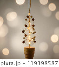 golden light bulb with snow on bokeh background 119398587