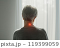 Elderly Woman Experiencing Neck Pain 119399059