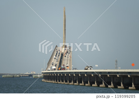 Sunshine Skyway Bridge over Tampa Bay in Florida with moving traffic. Concept of transportation infrastructure Sunshine Skyway Bridge over Tampa Bay in Florida with moving traffic. Concept of transportation infrastructure 119399205
