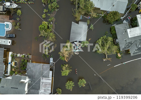 Surrounded by hurricane Ian rainfall flood waters homes in Florida residential area. Aftermath of natural disaster Surrounded by hurricane Ian rainfall flood waters homes in Florida residential area. Aftermath of natural disaster 119399206