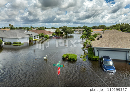 Flooding in Florida caused by tropical storm from hurricane Debby. Suburb houses in Laurel Meadows residential community surrounded by flood waters in Sarasota. Aftermath of natural disaster Flooding in Florida caused by tropical storm from hurricane Debby. Suburb houses in Laurel Meadows residential community surrounded by flood waters in Sarasota. Aftermath of natural disaster 119399587