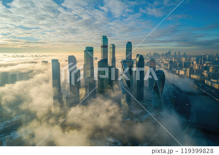 Aerial view of fog between skyscrapers in a big city Aerial view of fog between skyscrapers in a big city 119399828
