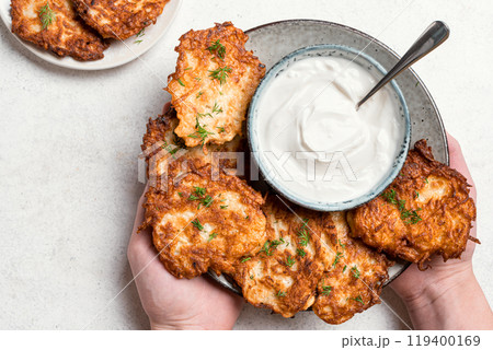 Potato latkes or hash browns Potato latkes or hash browns 119400169