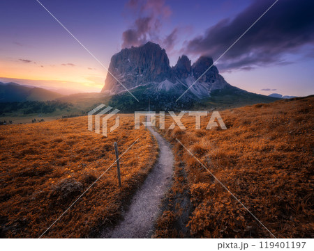Mountains and orange alpine meadows at sunset in golden autumn Mountains and orange alpine meadows at sunset in golden autumn 119401197
