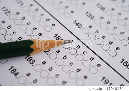 Answer sheets with pencil drawing fill to select choice, education. 119401744