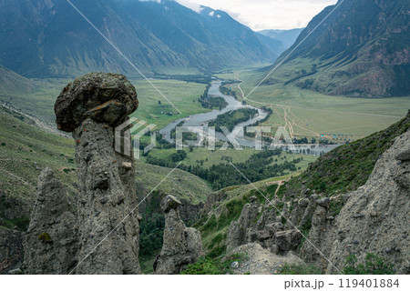 Picturesque green River Valley. Summertime natural landscape, mountains in the clouds, best recreation areas Picturesque green River Valley. Summertime natural landscape, mountains in the clouds, best recreation areas 119401884