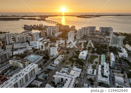 Above view of Sarasota city, Florida with waterfront office high-rise buildings and John Ringling Causeway leading from downtown to St. Armands Key. Development of housing and transportation in the US 119402640