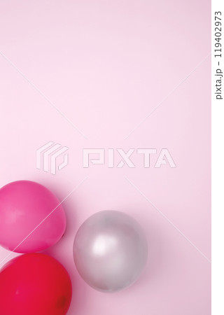 Birthday attributes colorful balloons. Concept of festive birthday celebrations 119402973