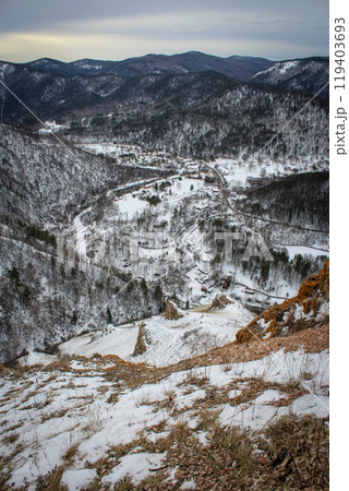 View from hill to country cottages. Winter landscape on outskirts of Krasnoyarsk 119403693