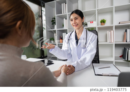 Doctor and Patient Consultation in Modern Clinic Setting with Medical Examination and Health Discussion 119403775