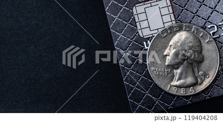 Dollar coin on credit card Dollar coin on credit card 119404208