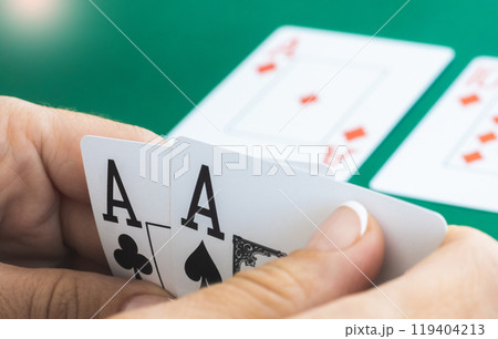Aces in hands of gambler Aces in hands of gambler 119404213