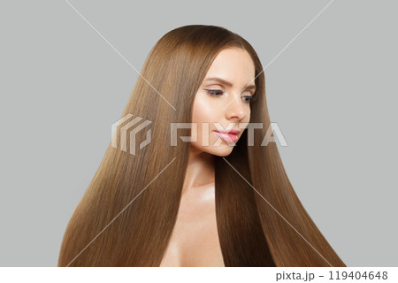 Brunette young woman model with modern make-up and long straight smooth hairstyle Brunette young woman model with modern make-up and long straight smooth hairstyle 119404648