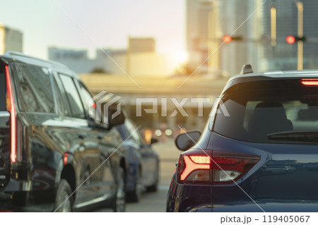 American street with driving cars at intersection with traffic lights in Miami, Florida. USA transportation 119405067