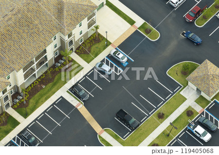 Apartment residential condos with car parking place in Florida suburban area. American condominiums as example of real estate development in USA suburbs 119405068